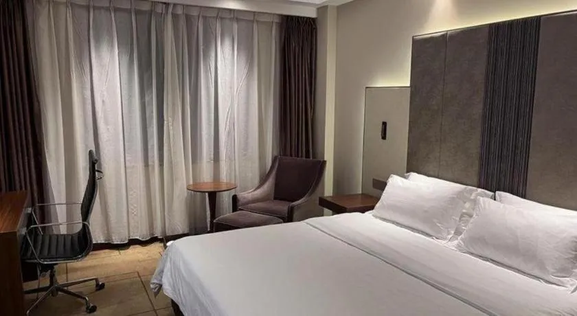 Bed in Metropolo Hotel Shijiazhuang Yuhua Wanda Plaza