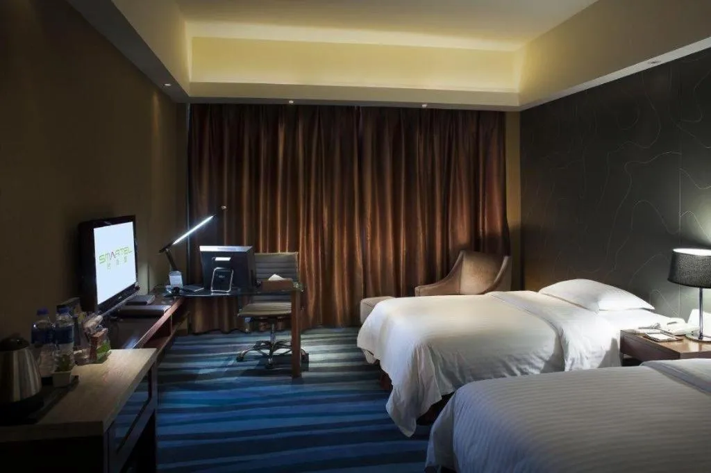 Bed in Metropolo Hotel Shijiazhuang Yuhua Wanda Plaza