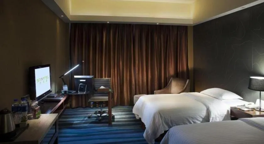 Bed in Metropolo Hotel Shijiazhuang Yuhua Wanda Plaza