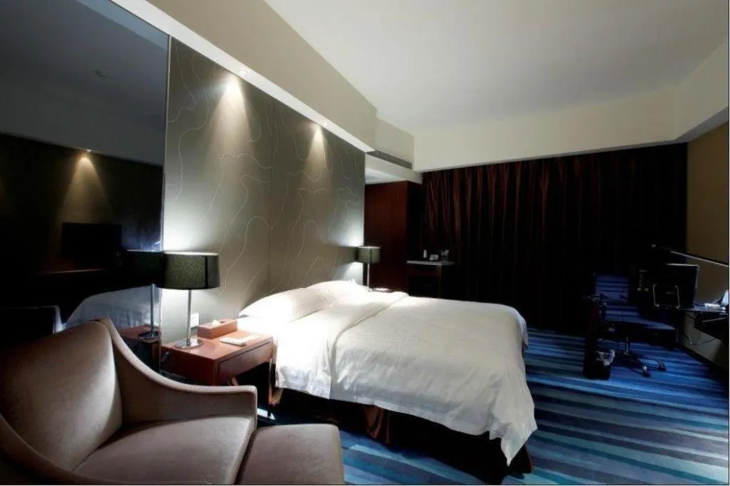 Bed in Metropolo Hotel Shijiazhuang Yuhua Wanda Plaza