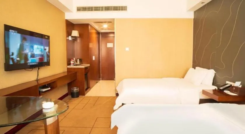 Bed in Metropolo Hotel Shijiazhuang Yuhua Wanda Plaza