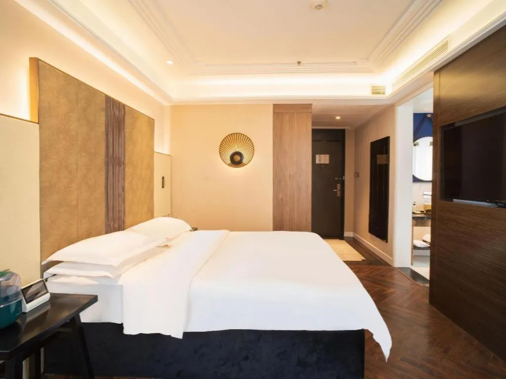 Bed in Metropolo Hotel Shijiazhuang Yuhua Wanda Plaza