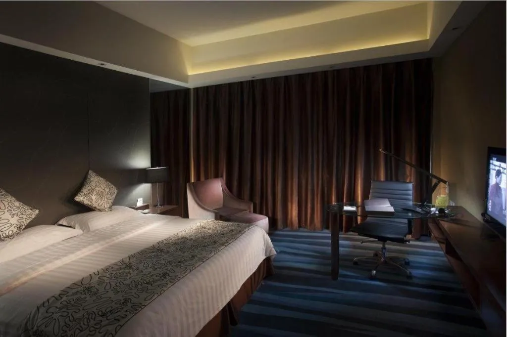 Bed in Metropolo Hotel Shijiazhuang Yuhua Wanda Plaza