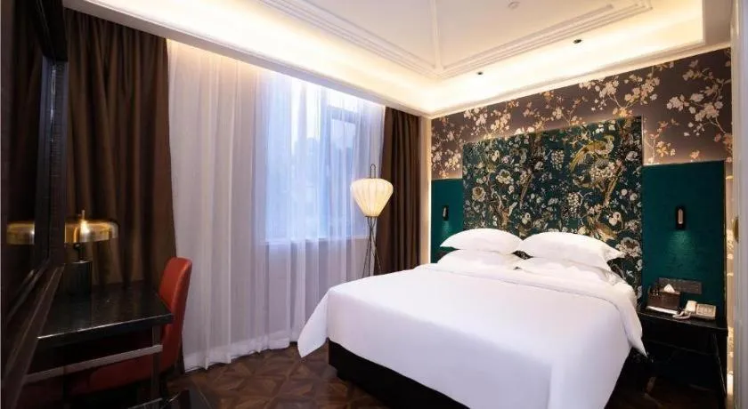 Bed in Metropolo Hotel Shijiazhuang Yuhua Wanda Plaza