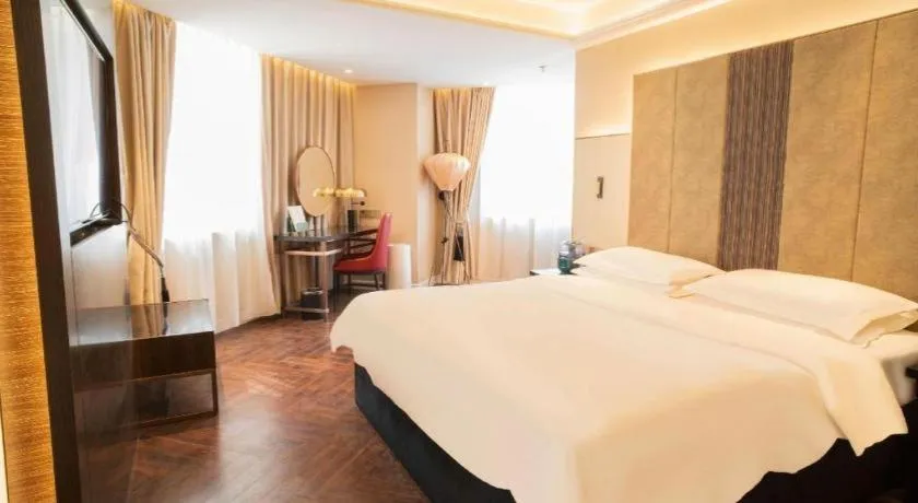 Bed in Metropolo Hotel Shijiazhuang Yuhua Wanda Plaza