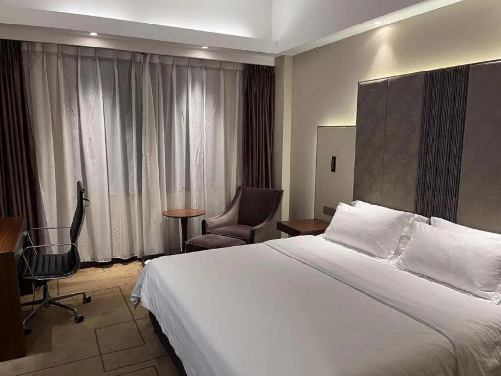 Bed in Metropolo Hotel Shijiazhuang Yuhua Wanda Plaza