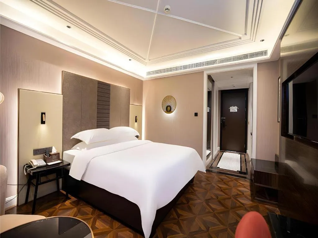 Bed in Metropolo Hotel Shijiazhuang Yuhua Wanda Plaza