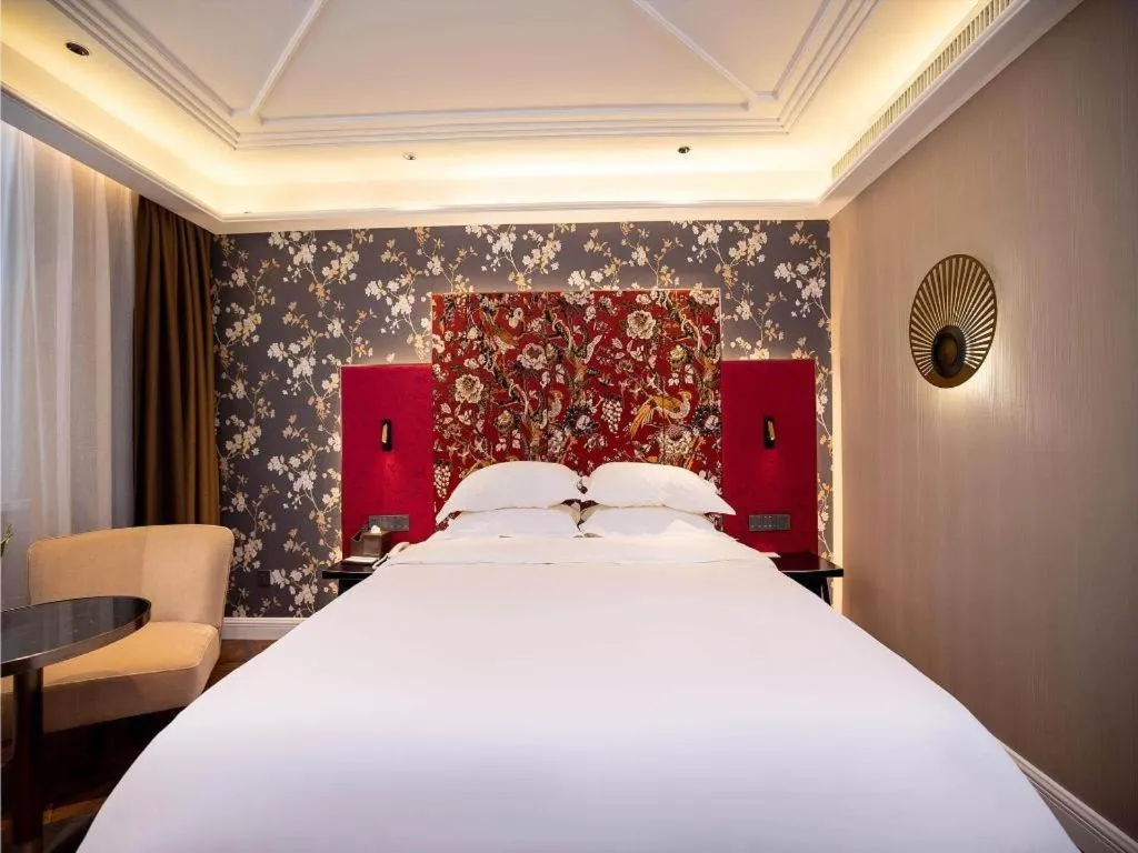Bed in Metropolo Hotel Shijiazhuang Yuhua Wanda Plaza