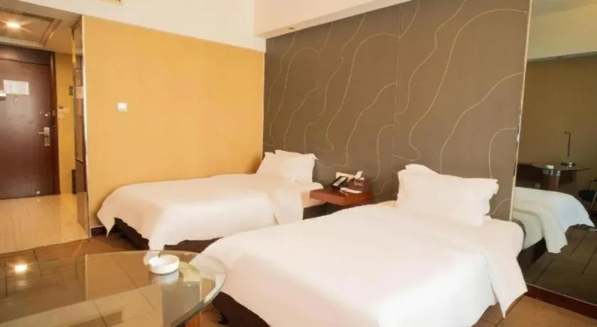 Bed in Metropolo Hotel Shijiazhuang Yuhua Wanda Plaza