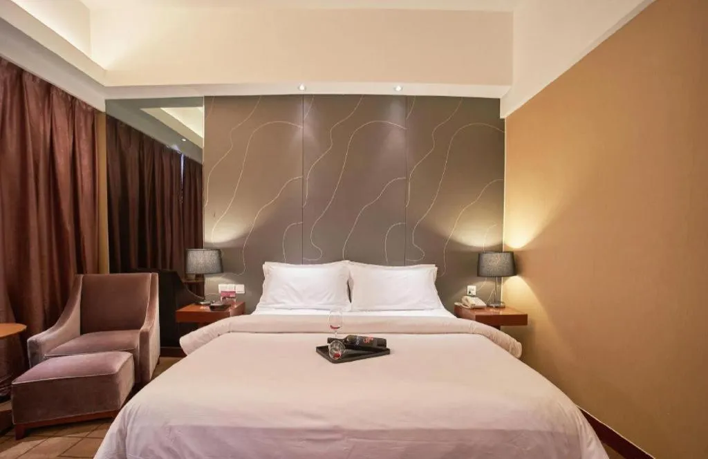 Bed in Metropolo Hotel Shijiazhuang Yuhua Wanda Plaza