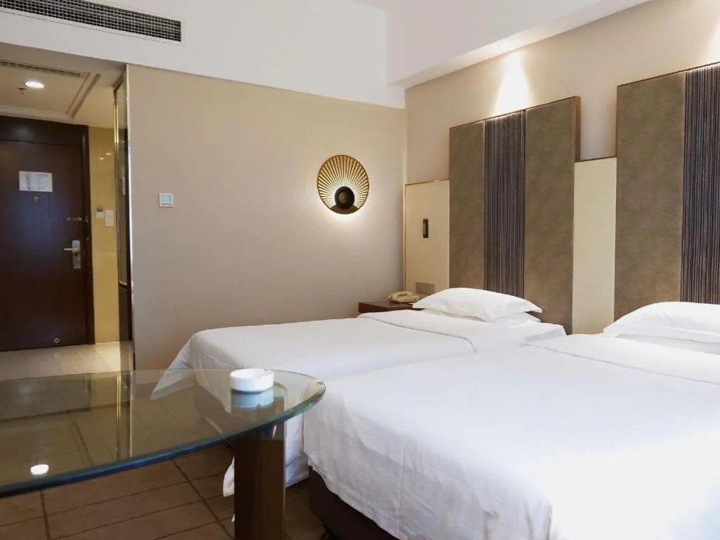 Bed in Metropolo Hotel Shijiazhuang Yuhua Wanda Plaza