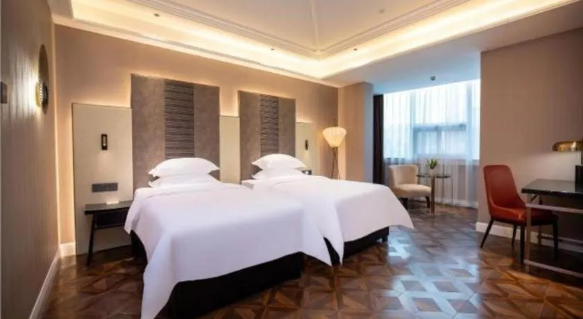 Bed in Metropolo Hotel Shijiazhuang Yuhua Wanda Plaza