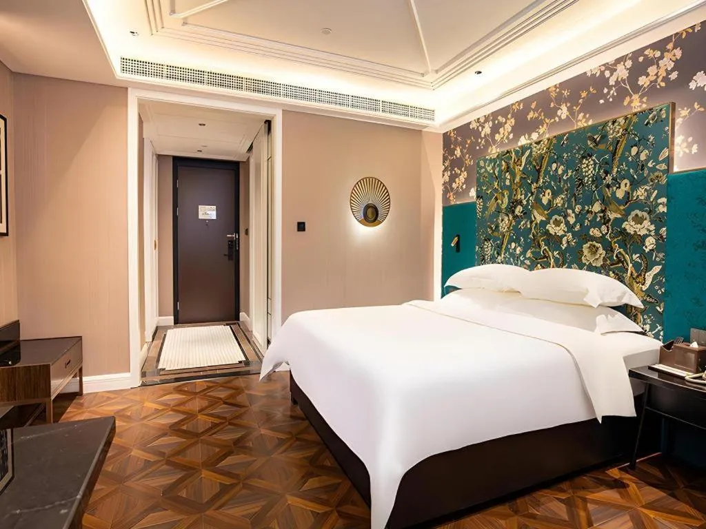 Bed in Metropolo Hotel Shijiazhuang Yuhua Wanda Plaza