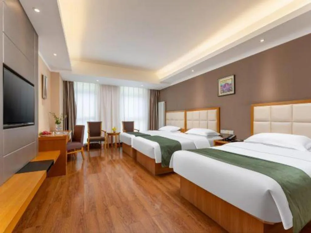Bed in GreenTree Inn Shandong Taian Feicheng Xincheng Road Business Hotel