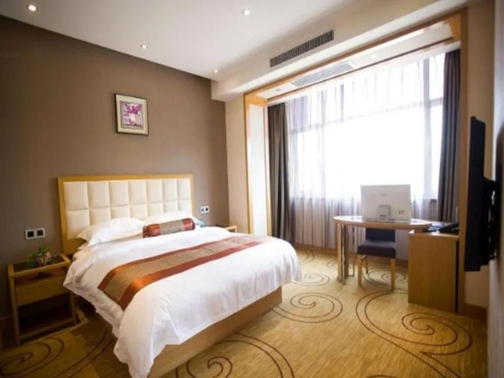 Bed in GreenTree Inn Shandong Taian Feicheng Xincheng Road Business Hotel