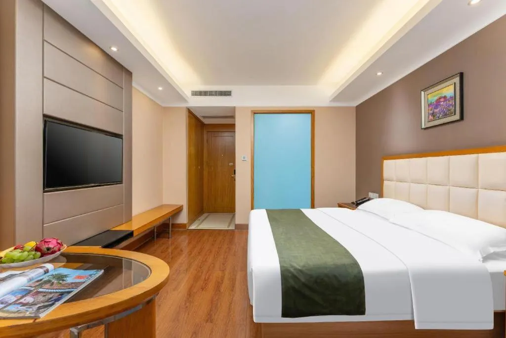 Bed in GreenTree Inn Shandong Taian Feicheng Xincheng Road Business Hotel