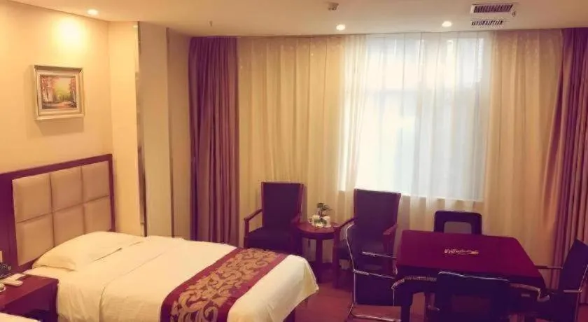 Bed in GreenTree Inn Jiangxi Shangrao Qianshan Ehu Avenue Express Hotel