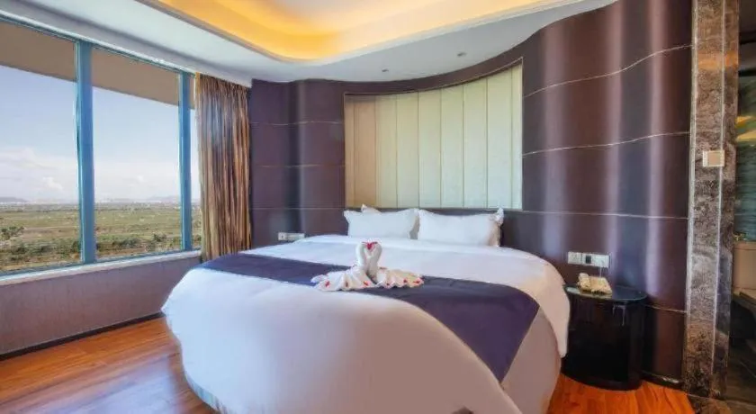 Bed in FOGER YACHT HOTEL