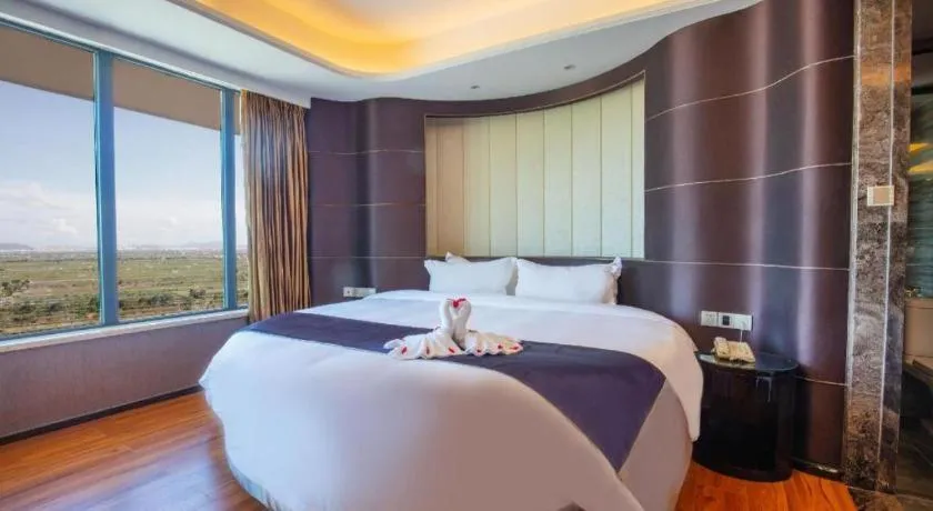 Bed in FOGER YACHT HOTEL