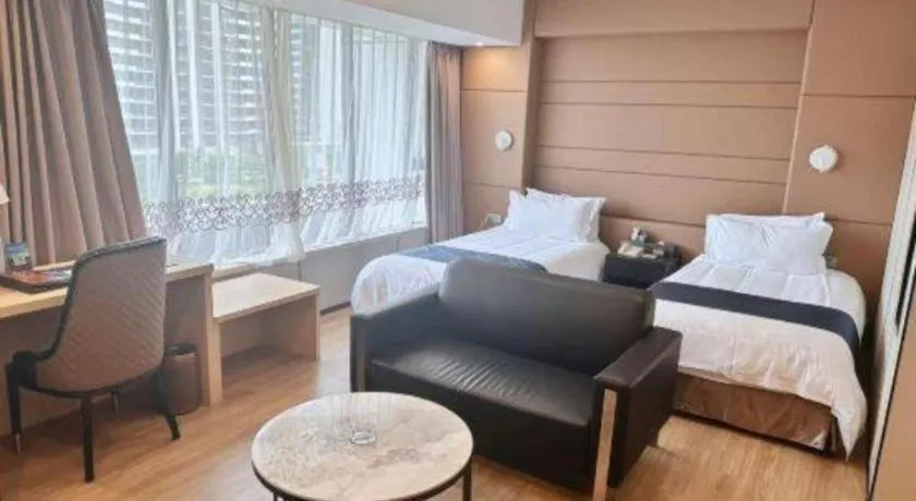 Bed in FOGER YACHT HOTEL