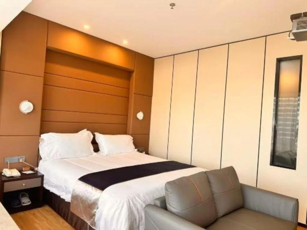 Bed in FOGER YACHT HOTEL