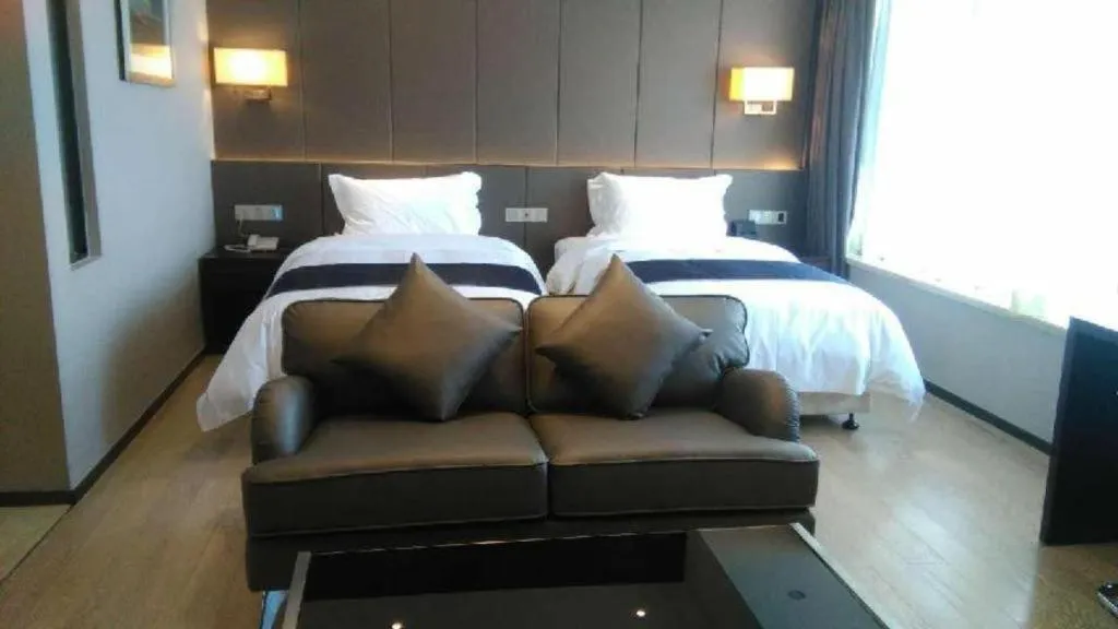 Bed in FOGER YACHT HOTEL