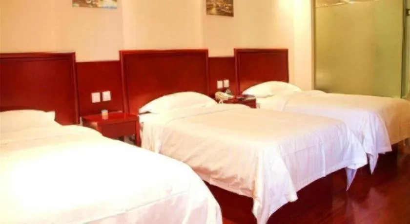 Bed in GreenTree Inn Linyi Feixian Jianshe Road Express Hotel