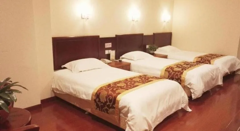 Bed in GreenTree Inn Linyi Feixian Jianshe Road Express Hotel
