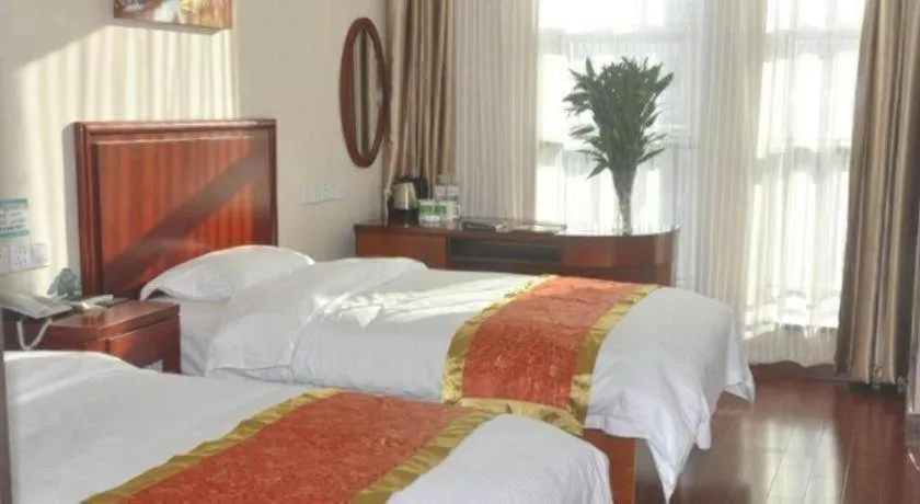 Bed in GreenTree Inn Linyi Feixian Jianshe Road Express Hotel