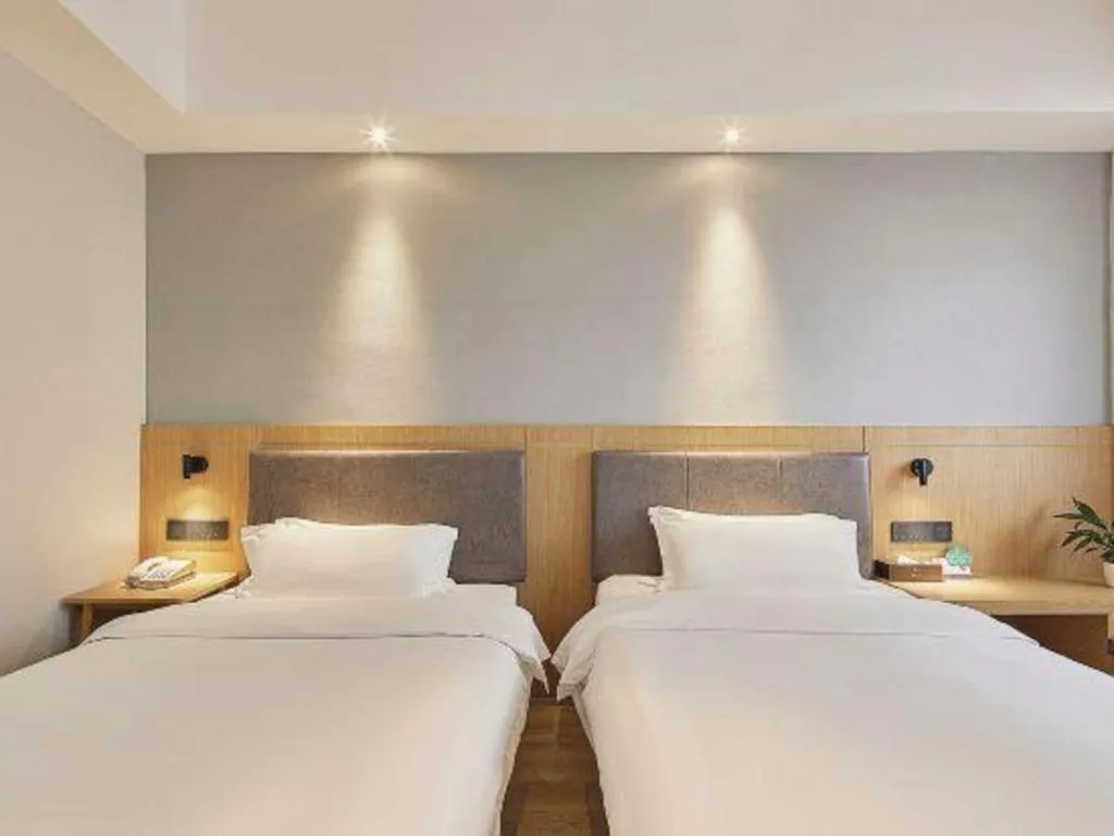 Bed in Insail Hotels Guangzhou Huangpu Dashadi Metro Station