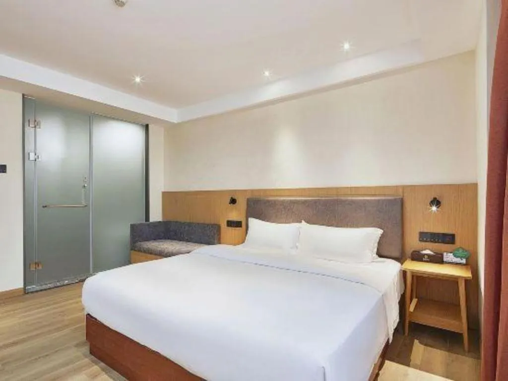 Bed in Insail Hotels Guangzhou Huangpu Dashadi Metro Station