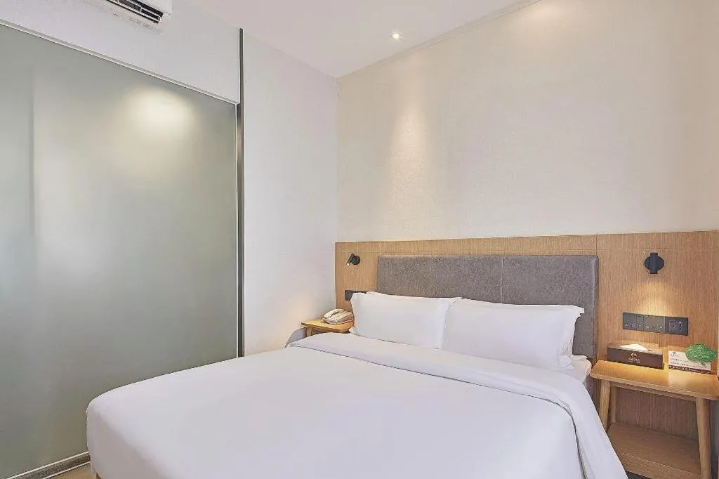Bed in Insail Hotels Guangzhou Huangpu Dashadi Metro Station