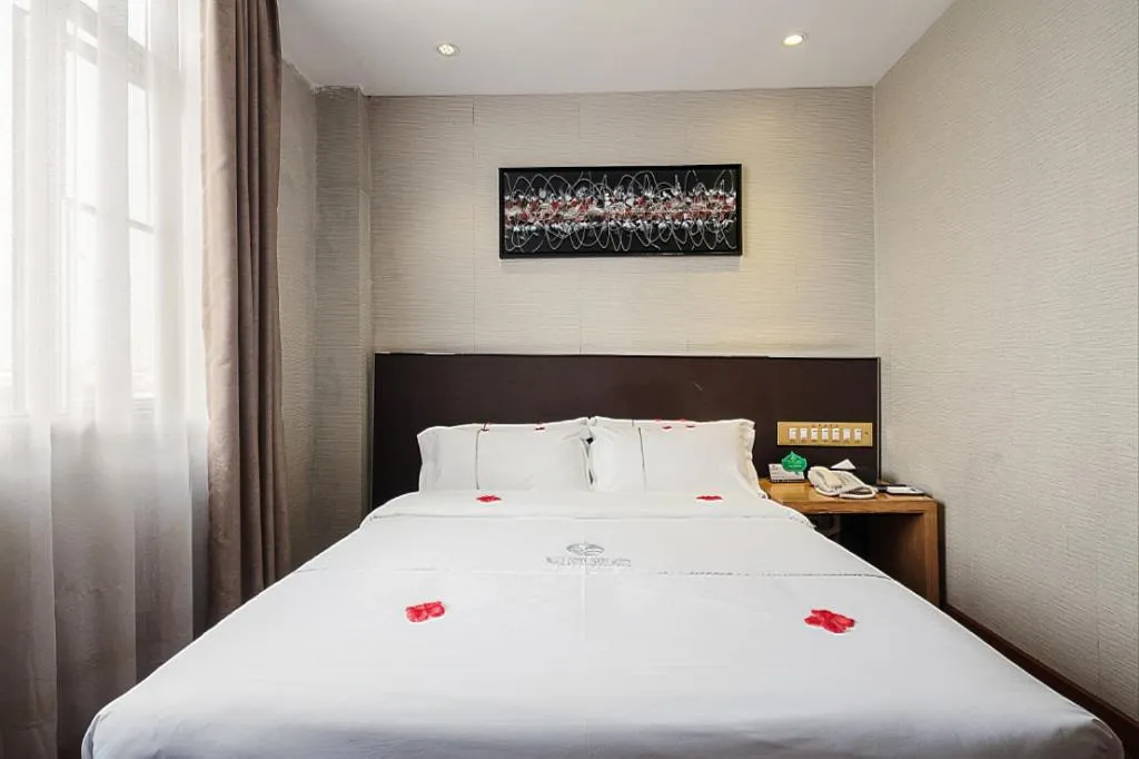 Bed in Insail Hotels Guangzhou Huangpu Dashadi Metro Station
