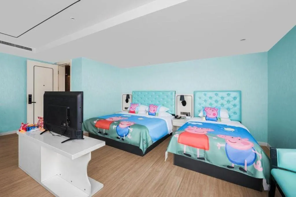 Bed in Qingdao Galaxy Holiday Hotel