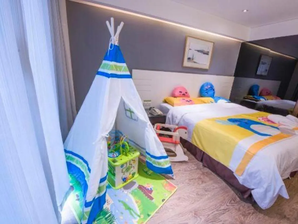 Bed in Tianjin Juchuan Lily Hotel