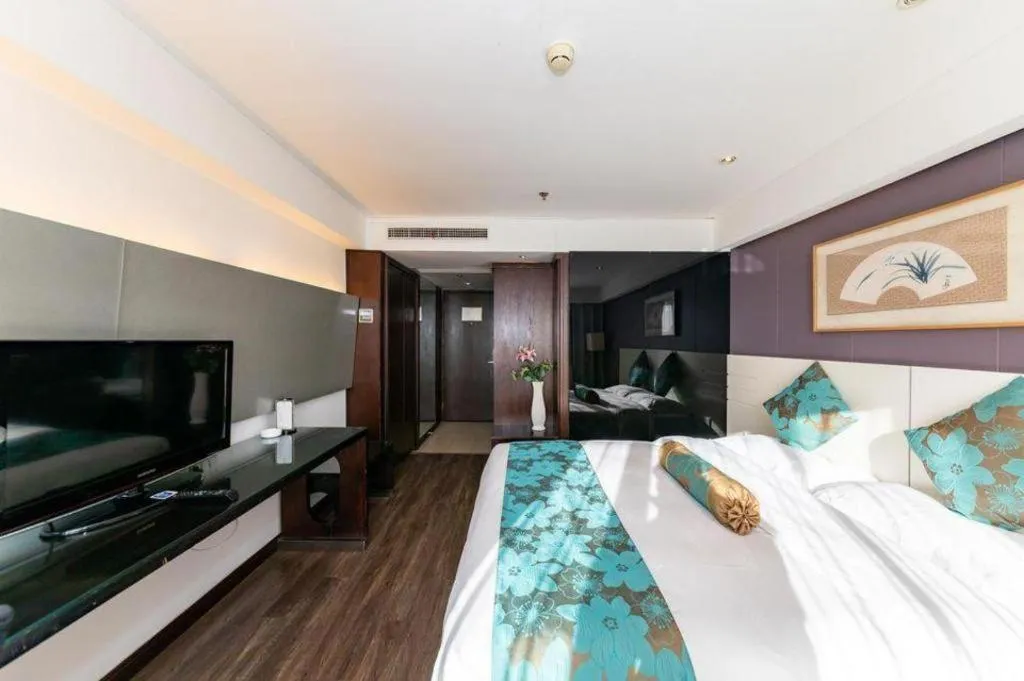 Bed in Tianjin Juchuan Lily Hotel