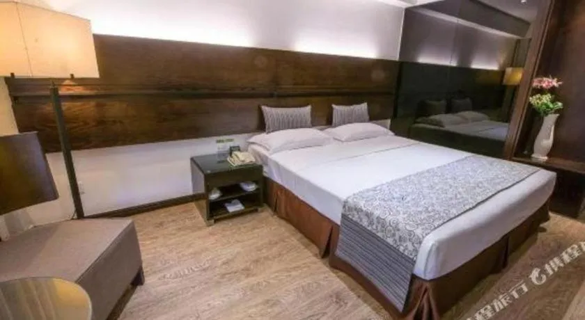 Bed in Tianjin Juchuan Lily Hotel