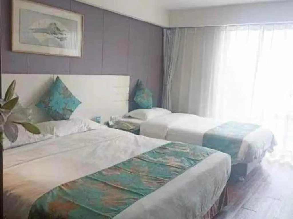 Bed in Tianjin Juchuan Lily Hotel