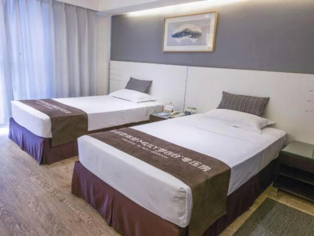 Bed in Tianjin Juchuan Lily Hotel