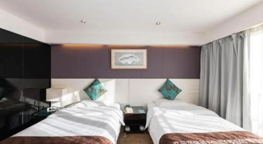 Bed in Tianjin Juchuan Lily Hotel