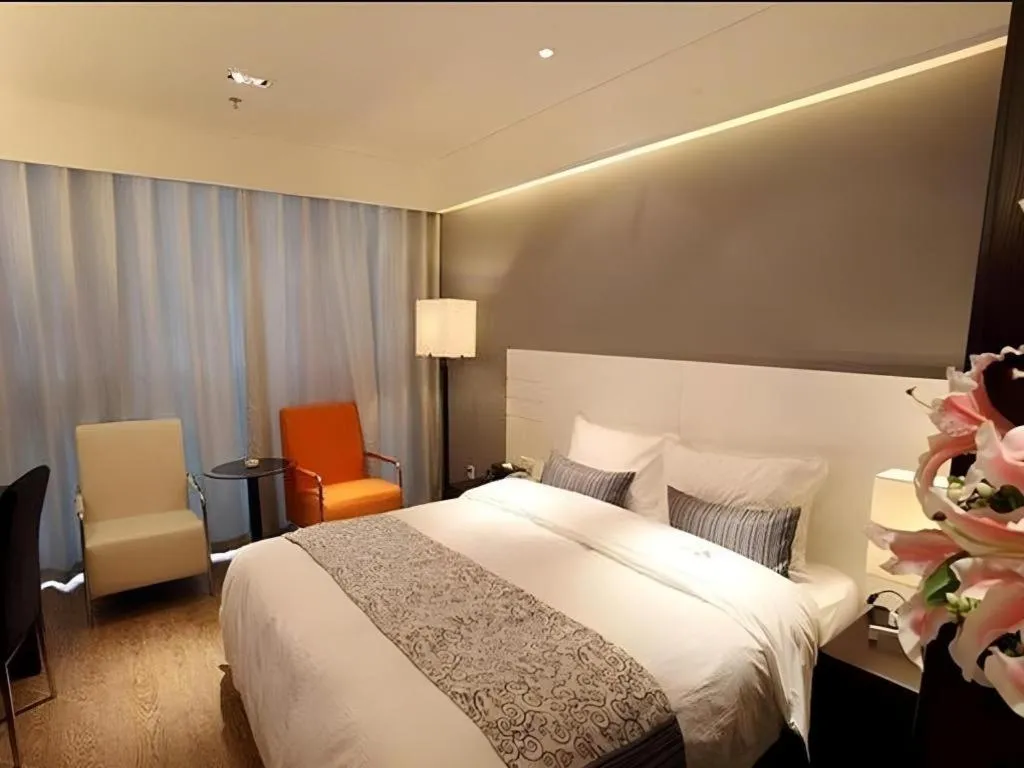 Bed in Tianjin Juchuan Lily Hotel