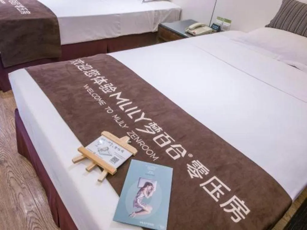 Bed in Tianjin Juchuan Lily Hotel