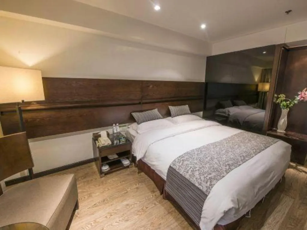 Bed in Tianjin Juchuan Lily Hotel