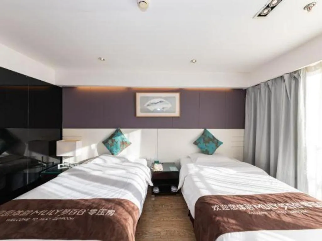 Bed in Tianjin Juchuan Lily Hotel