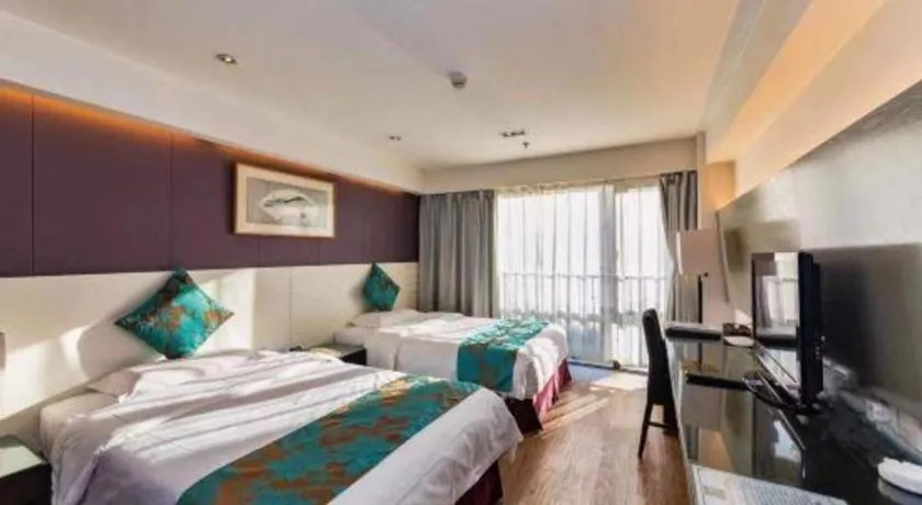 Bed in Tianjin Juchuan Lily Hotel