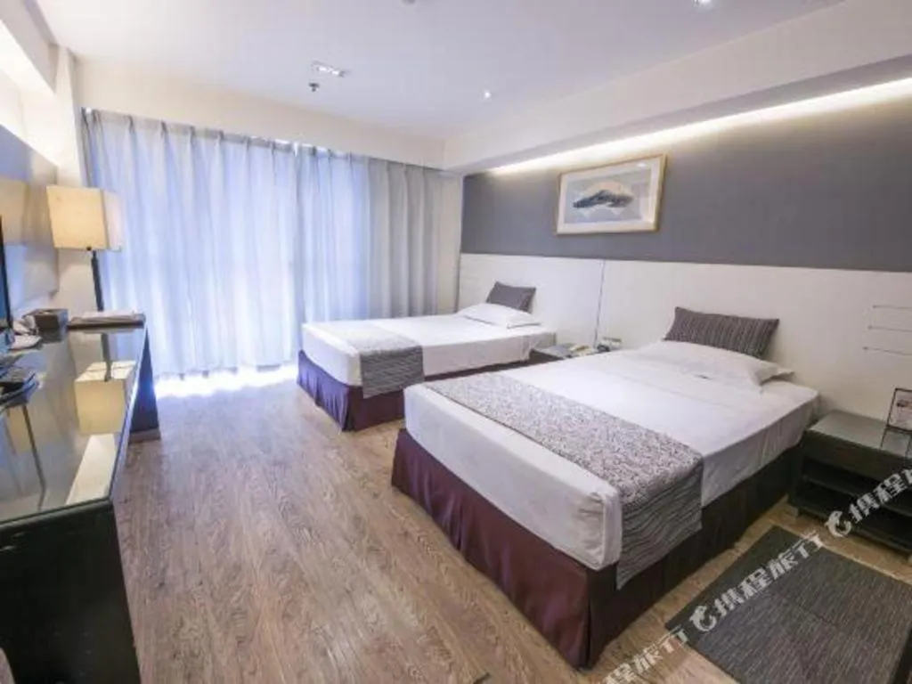 Bed in Tianjin Juchuan Lily Hotel