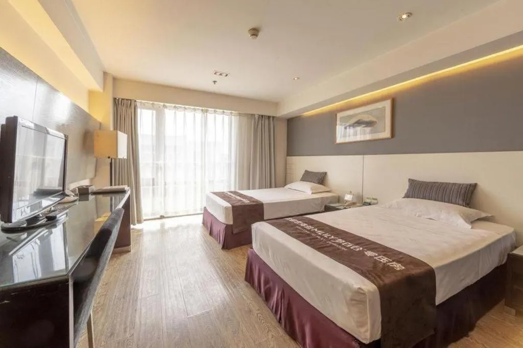 Bed in Tianjin Juchuan Lily Hotel