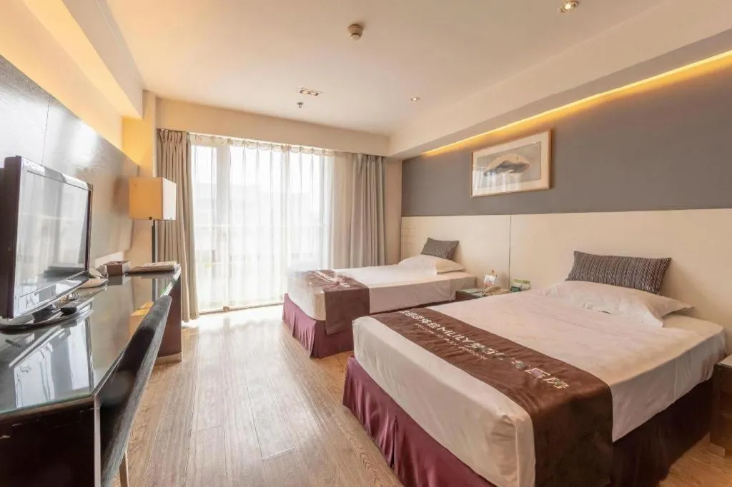 Bed in Tianjin Juchuan Lily Hotel