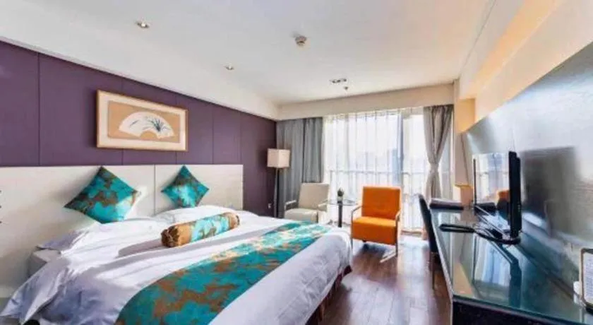 Bed in Tianjin Juchuan Lily Hotel