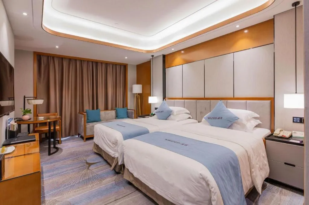 Bed in Excemon Yuyao Hemudu Hotel